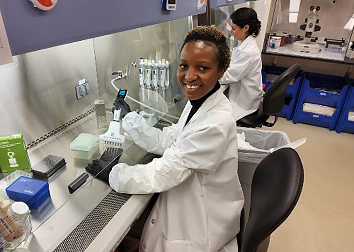 Researcher pipetting